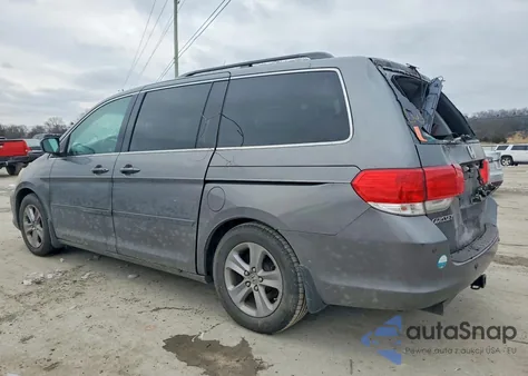 2010 Honda Odyssey Touring z USA, uszkodzony, nr VIN 5FNRL3H96AB069183